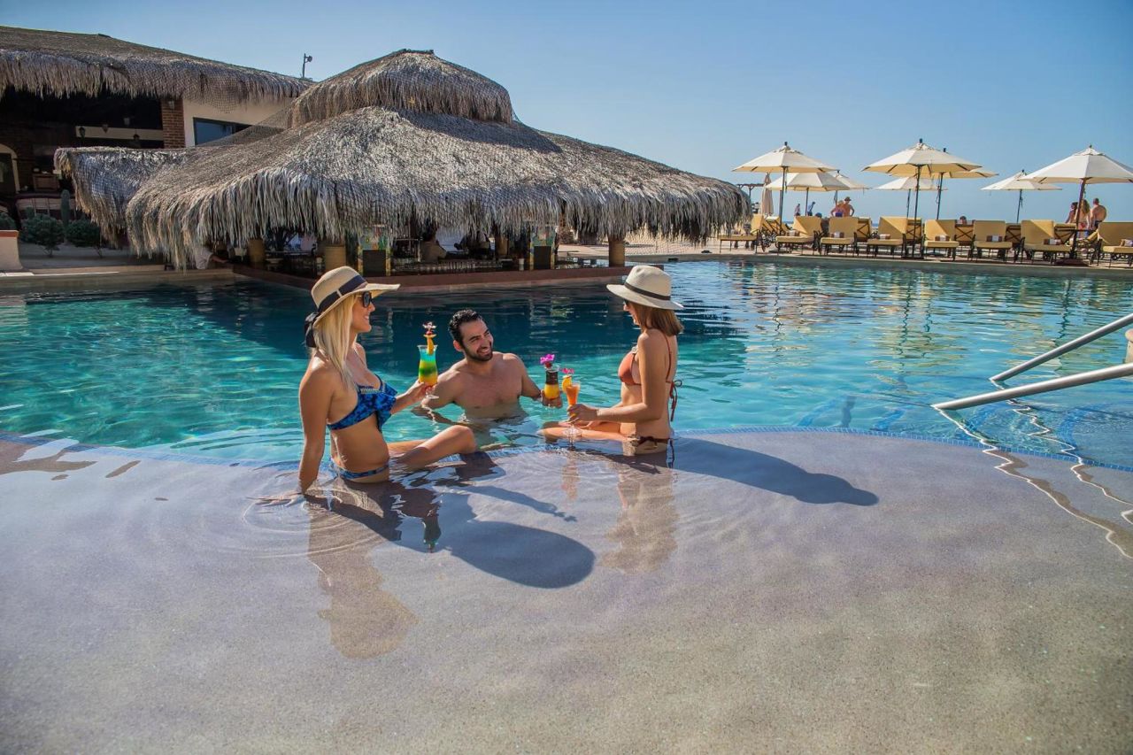 Friends at the pool of the Solmar Resort in Cabo San Lucas